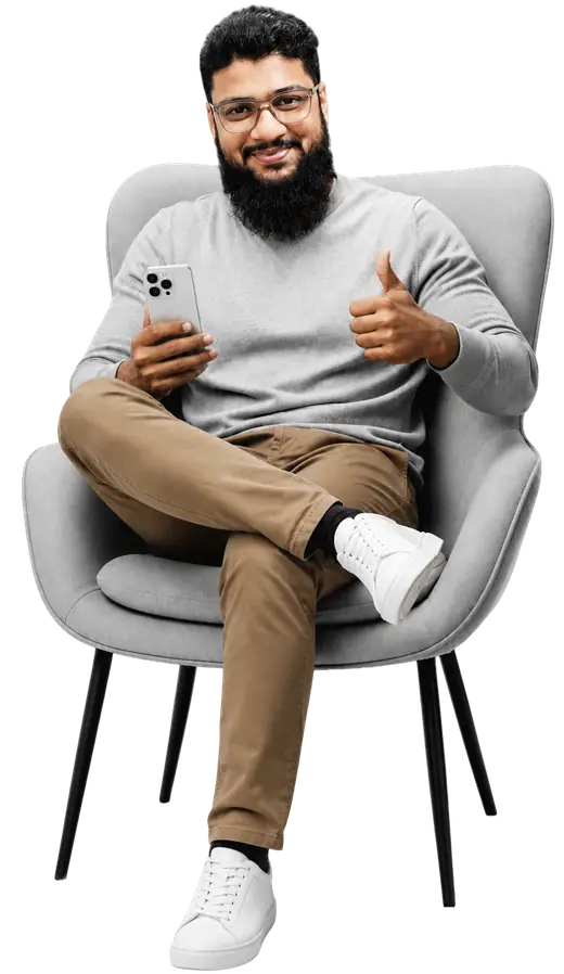 Ali Hossain sitting in a chair